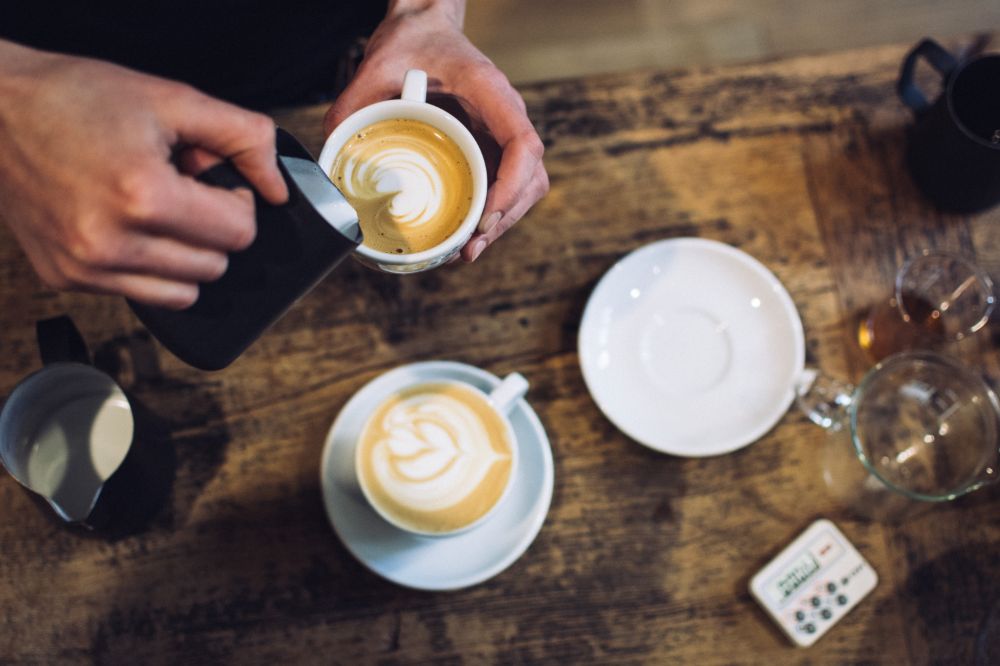 Closeup of creating coffee art